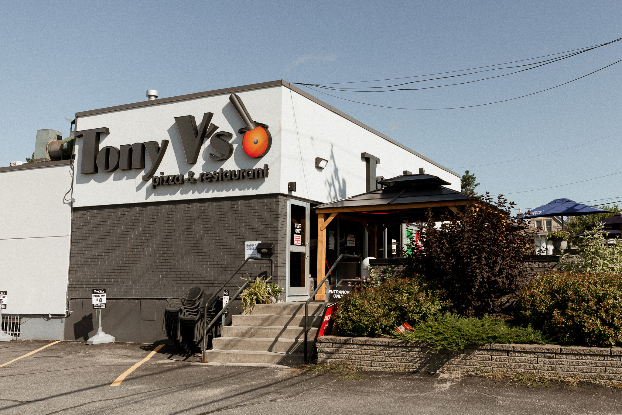 Exterior of Tony V’s Restaurant, a local business benefiting from a commercial water heater upgrade in Sudbury